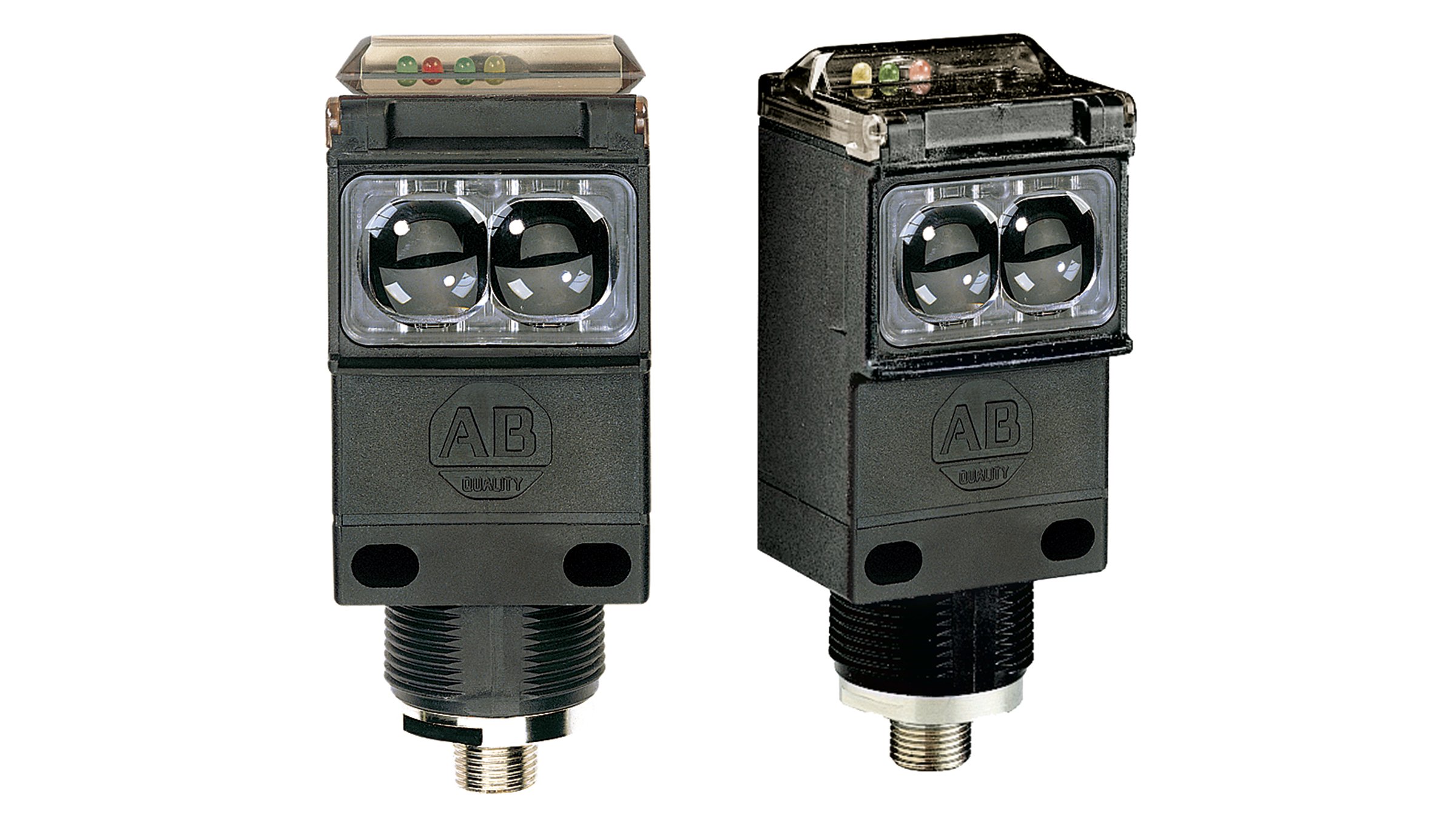 2 sensores retangulares pretos com faces de sensor circulares na lateral, indicador LED estático na parte superior e rosca de aço inoxidável na parte inferior