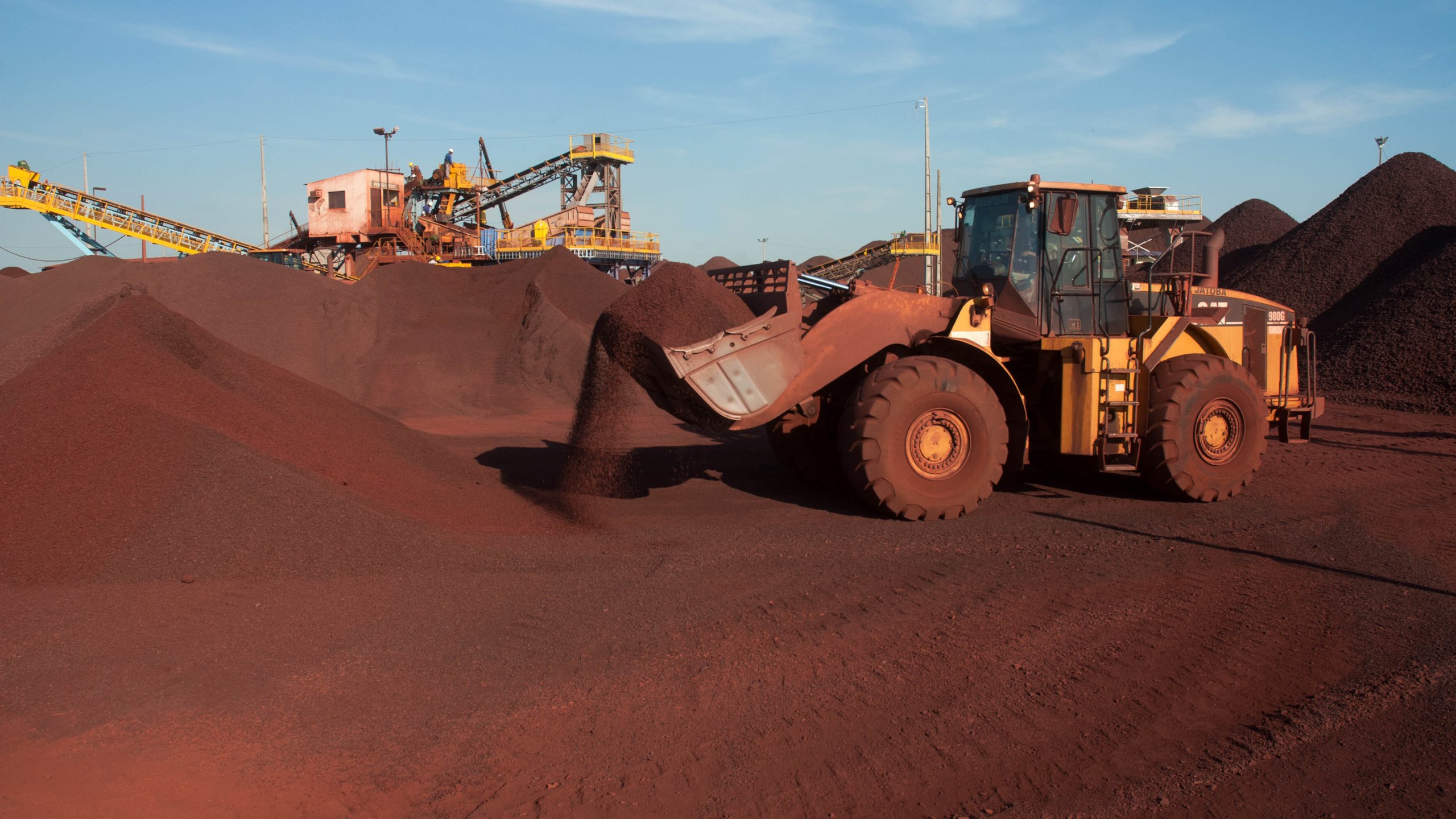 Front load equipment on a site scooping minerals