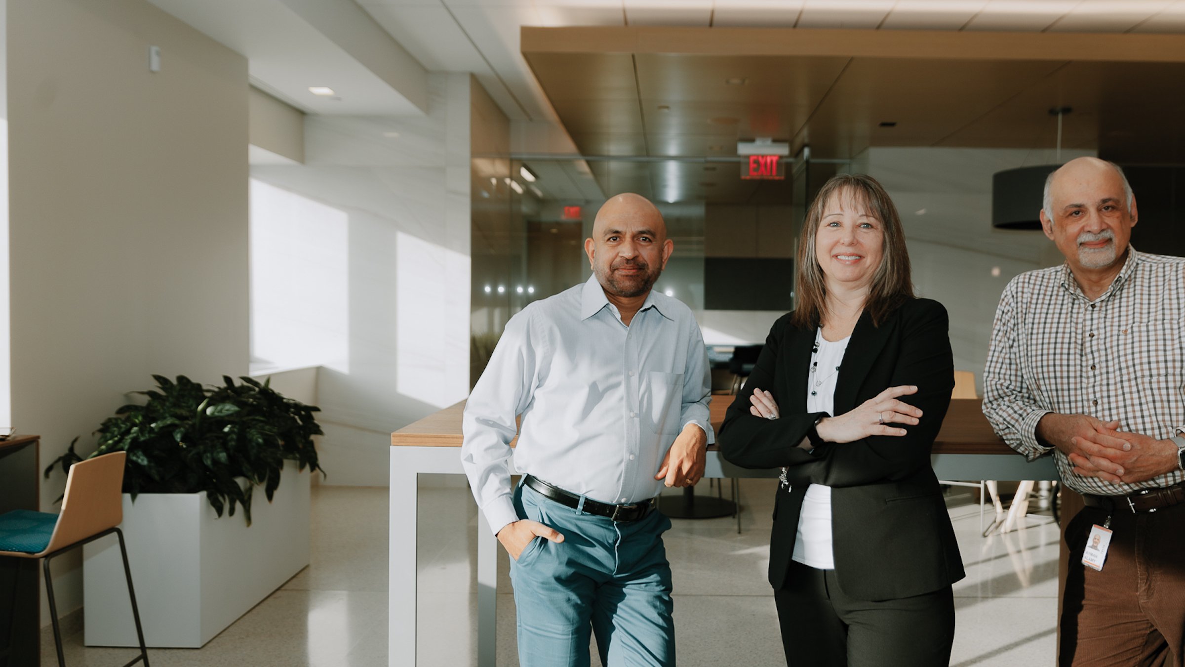 Gopi Reddy, Linda Kasulke and Ayman Alamy from the Faith Friendly & Allies ERG pose at the Milwaukee headquarters of Rockwell Automation.