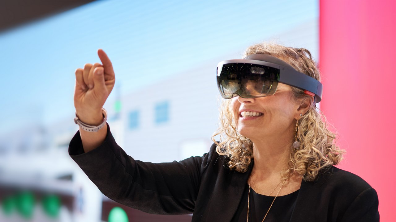 Woman wears a Virtual Reality headset on