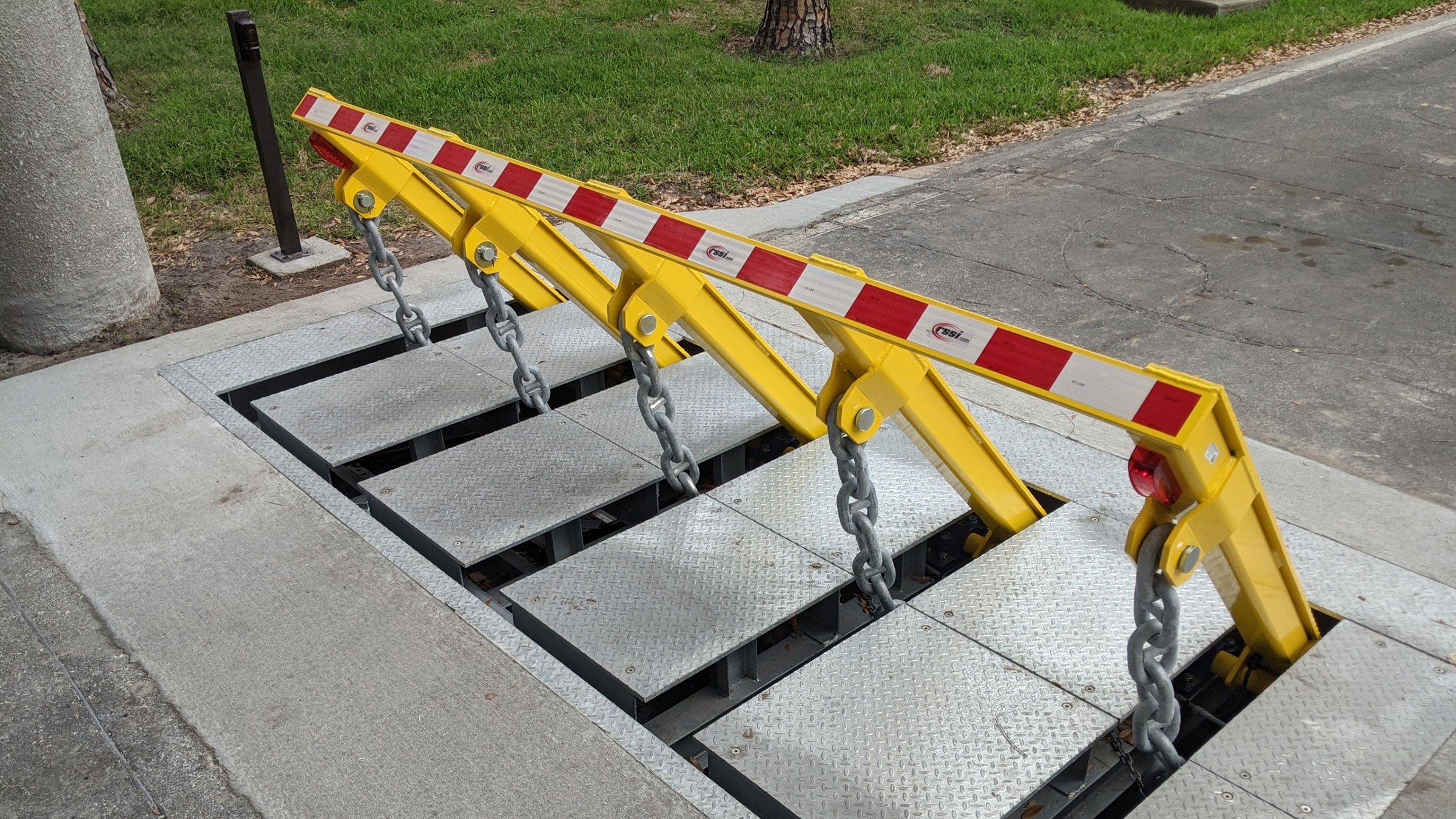 Finger wedge barrier to restrict vehicle entrance Subtitle