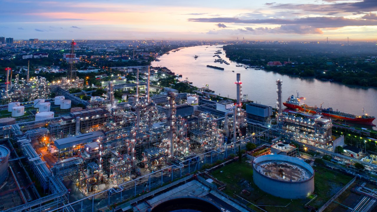 Aerial view of twilight of oil refinery ,Shot from drone of Oil refinery and Petrochemical plant at dusk