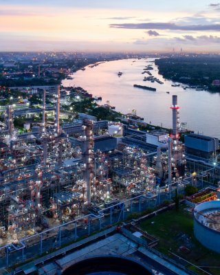 Aerial view of twilight of oil refinery ,Shot from drone of Oil refinery and Petrochemical plant at dusk