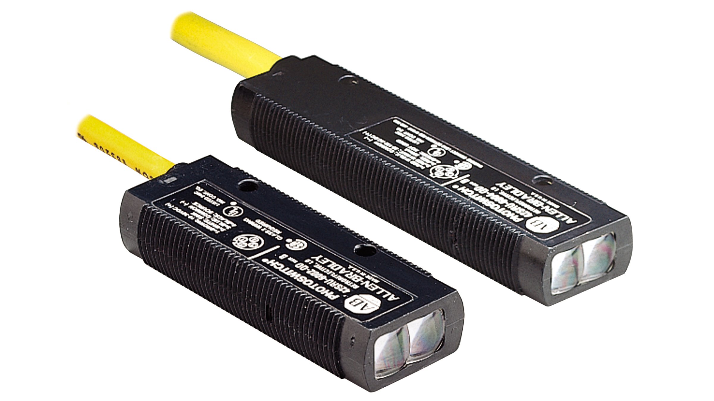 Two Allen-Bradley black flat sensors with integrated yellow cables.