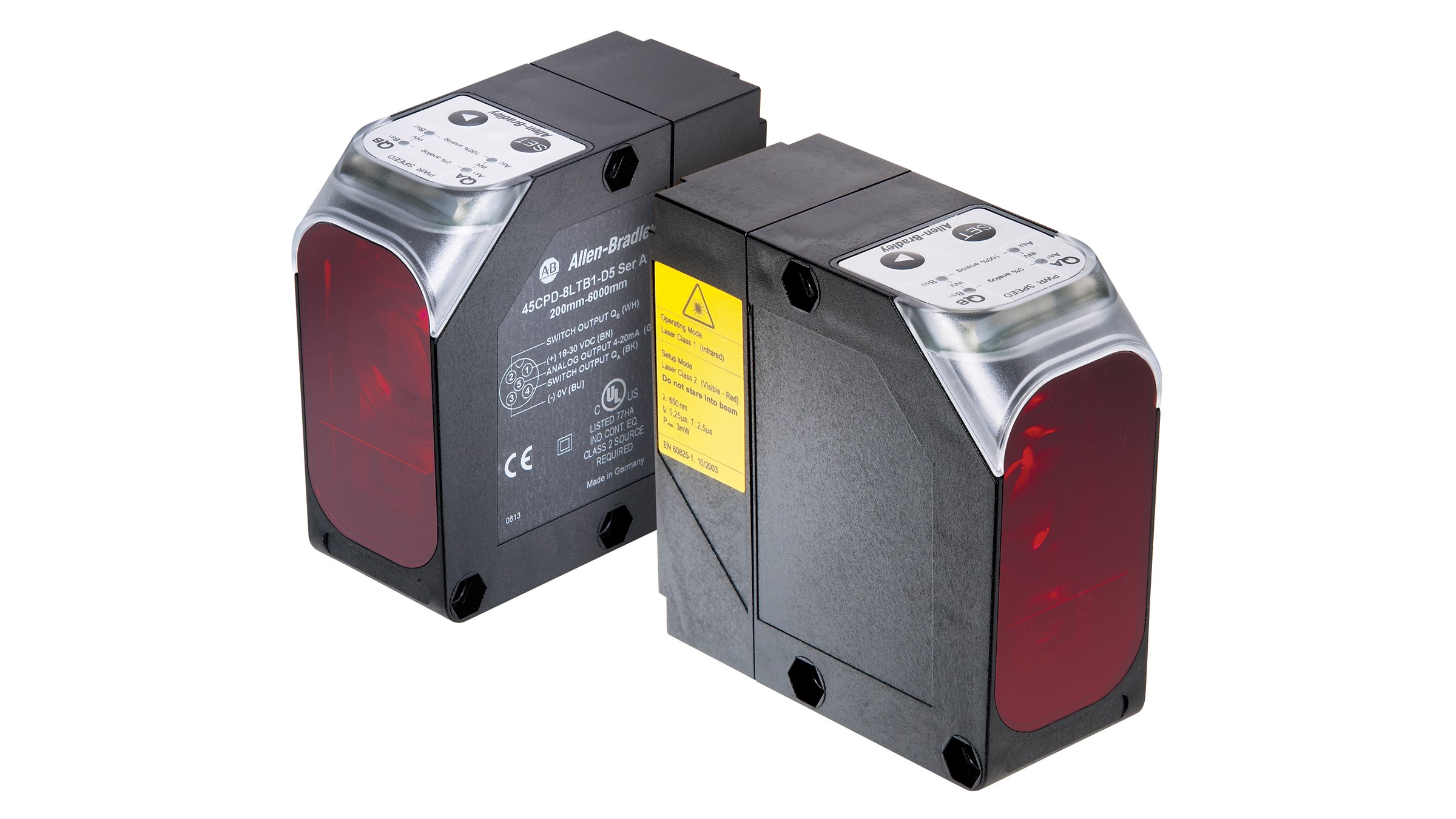 Two black Allen-Bradley rectangular sensors with red lenses.