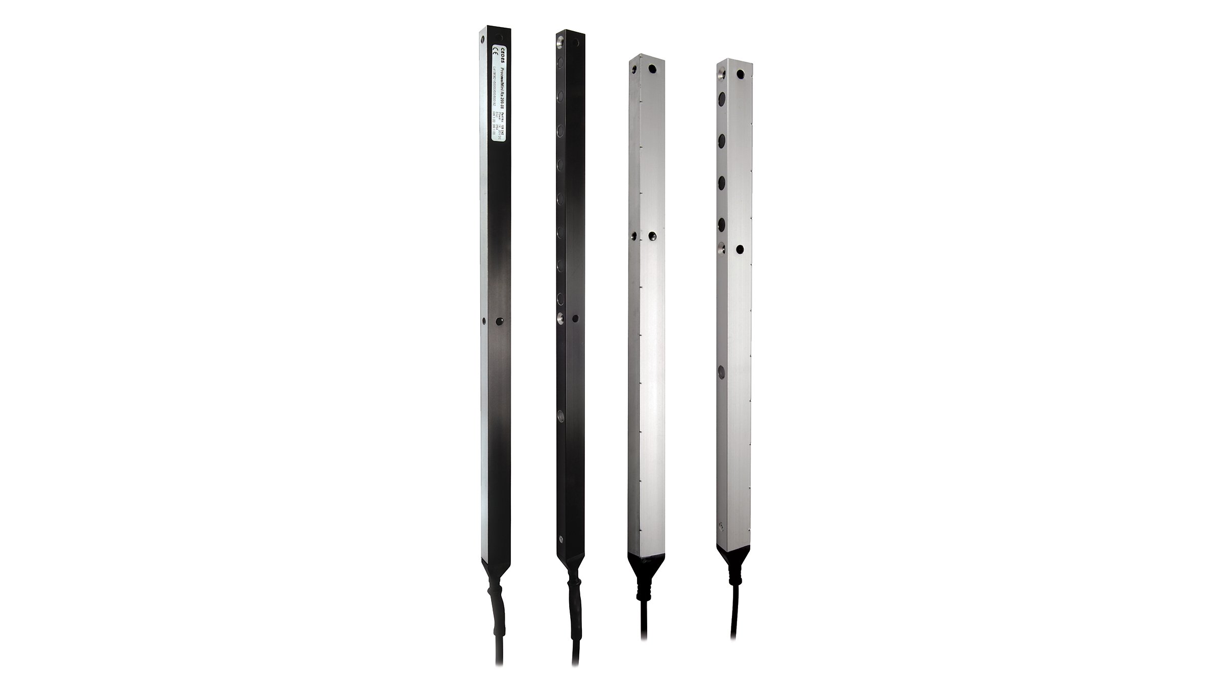 Four Allen-Bradley black and stainless steel, rectangular sensors with integrated cables.
