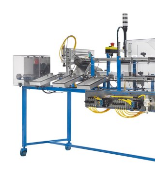Supply chain technician training system replicates common distribution center operations and features conveyor belts, three diverter chutes and a small control system cabinet.