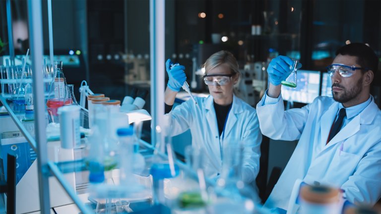 Two workers in a lab