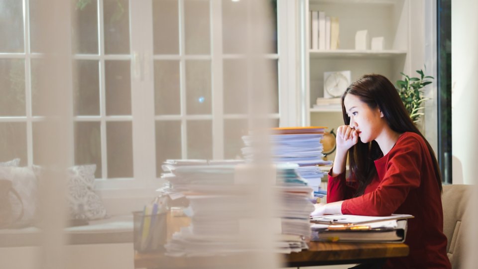 Asian Employee overtime working at home, Workaholic people, Shot from the window