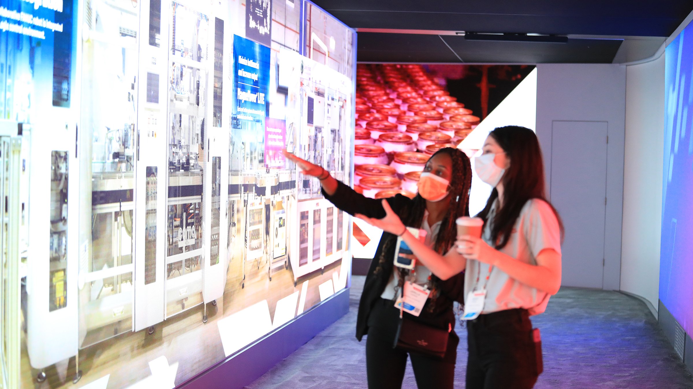 Rockwell Automation customers experiencing the newest innovations in an interactive exhibit at a tradeshow. 