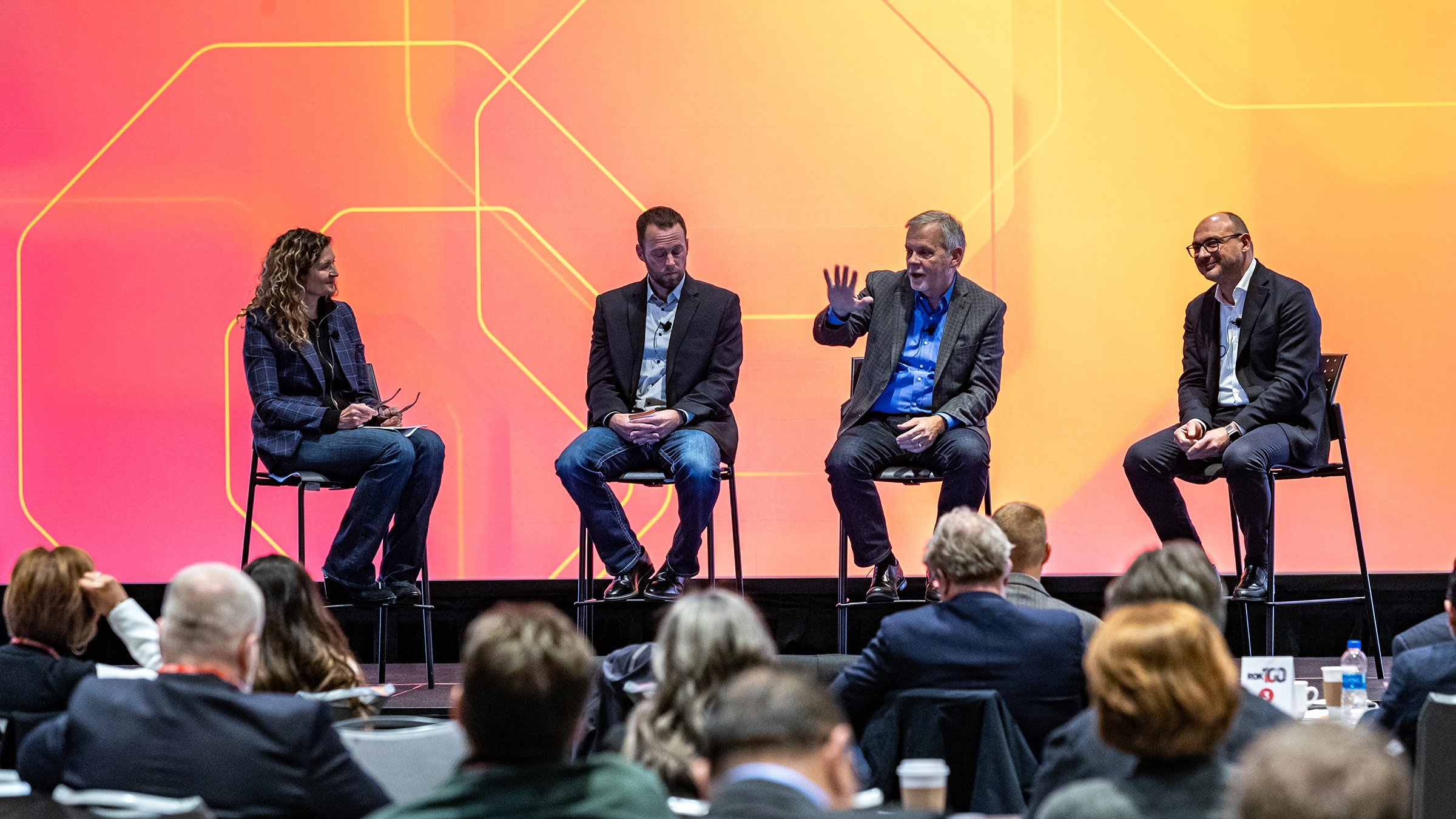 Panel of people on a stage