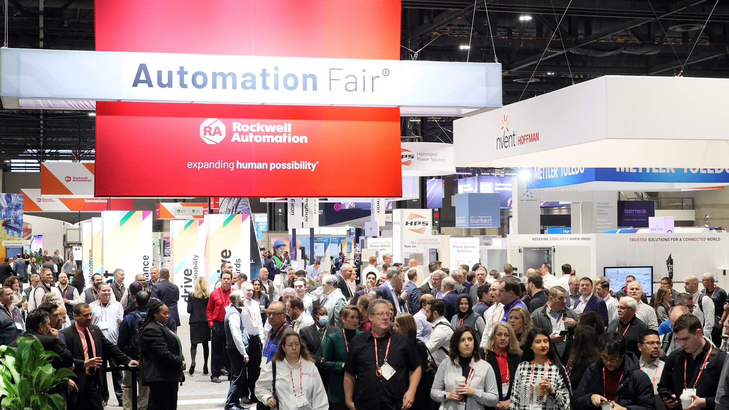 Attendees enter the hall at McCormick Place on the first day of Automation Fair 2022