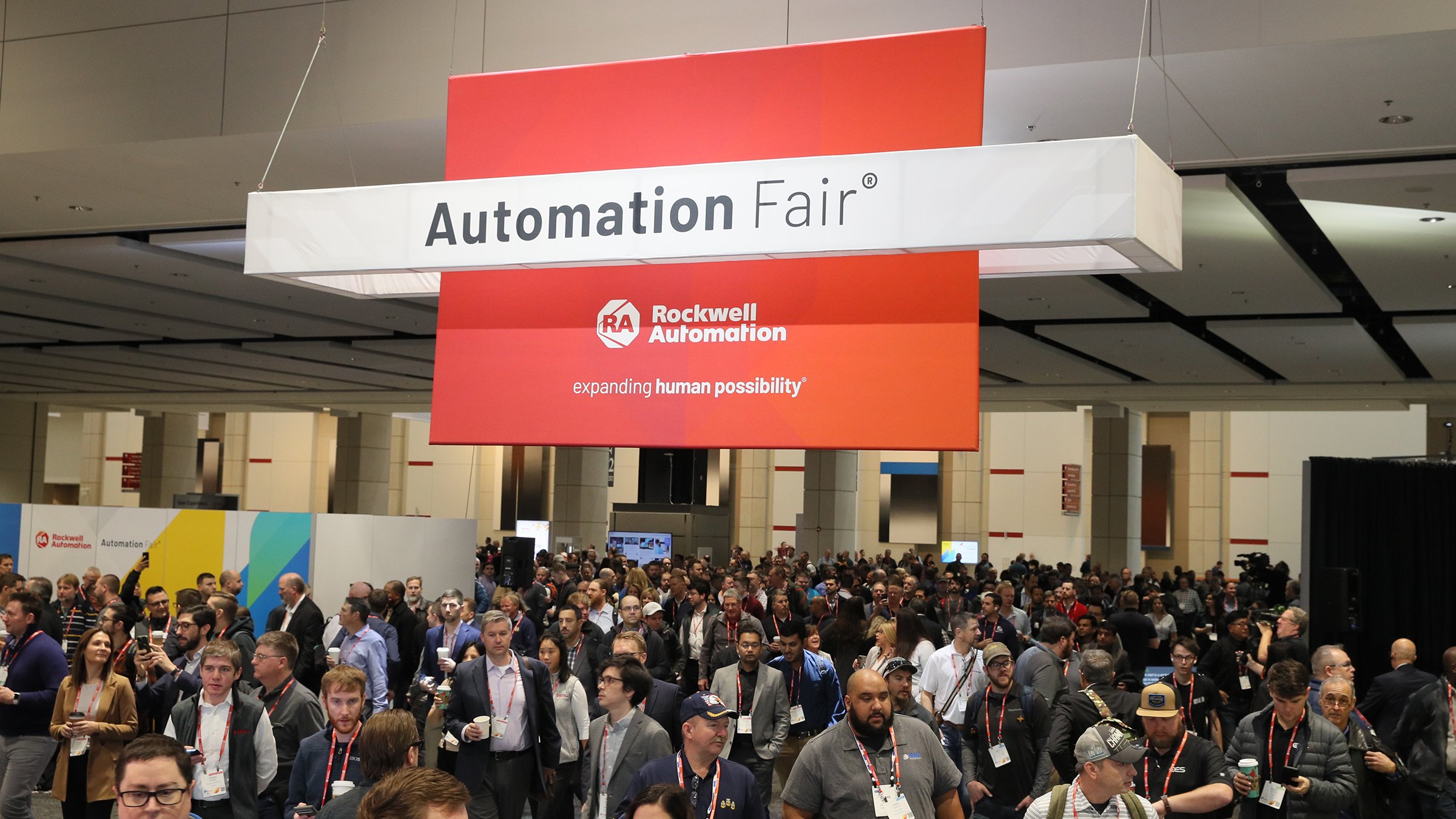 Attendees enter the hall at McCormick Place on the first day of Automation Fair 2022