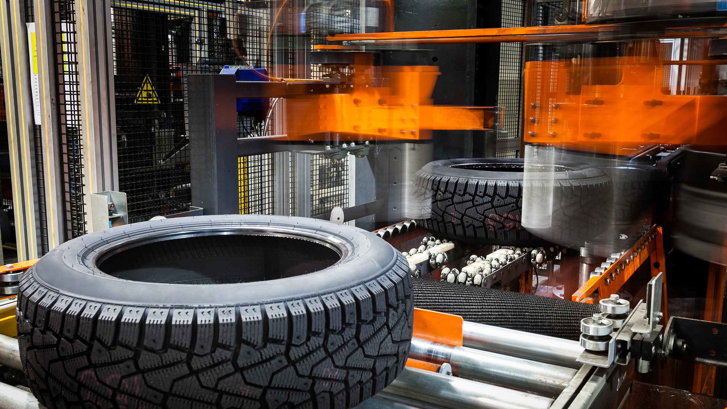 Tires on a manufacturing line conveyor