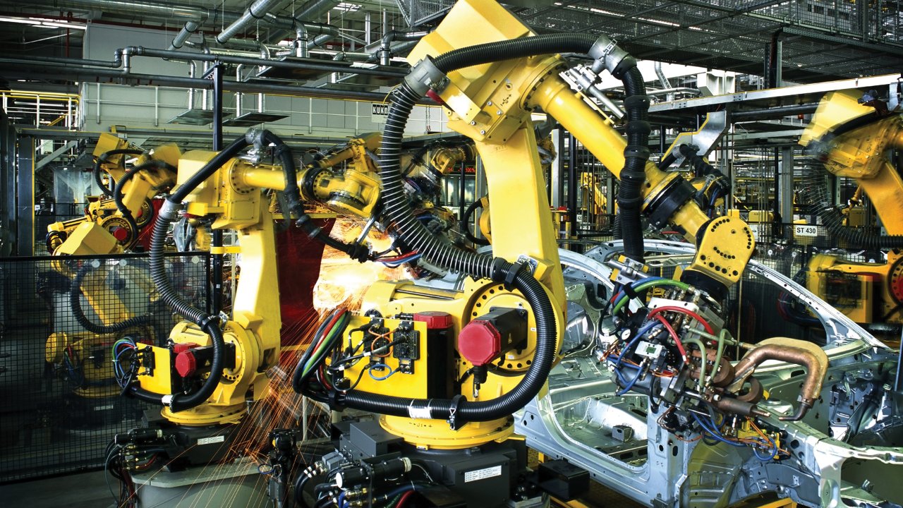 Welding robots in an automotive manufacturing plant