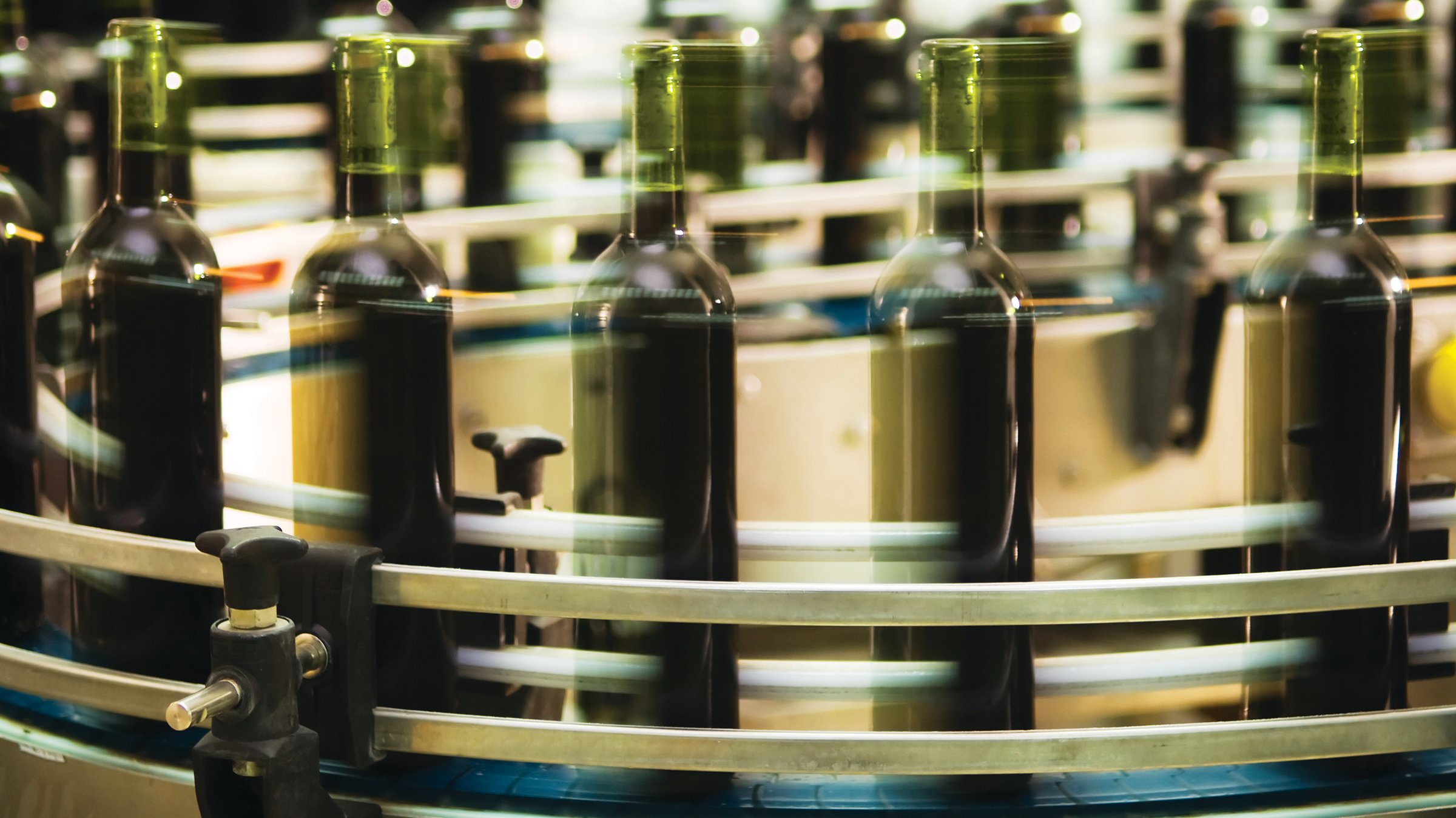 Bottles on a fast moving production line