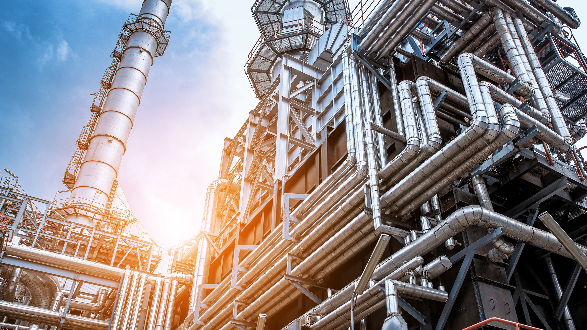 Close up Industrial view at oil refinery plant form industry zone with sunrise and cloudy sky