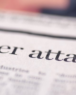 newspaper headline about a cyber attack, cybersecurity
