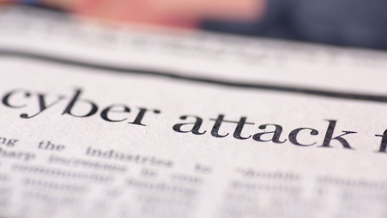 Zeitungsschlagzeile zu einem Cyberangriff, Cybersicherheit