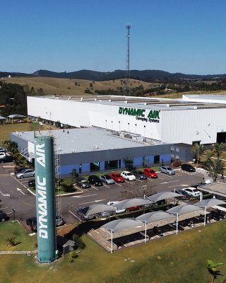 Side view of indusrial building that is the headquarters of Dynamic Air Conveying Systems 