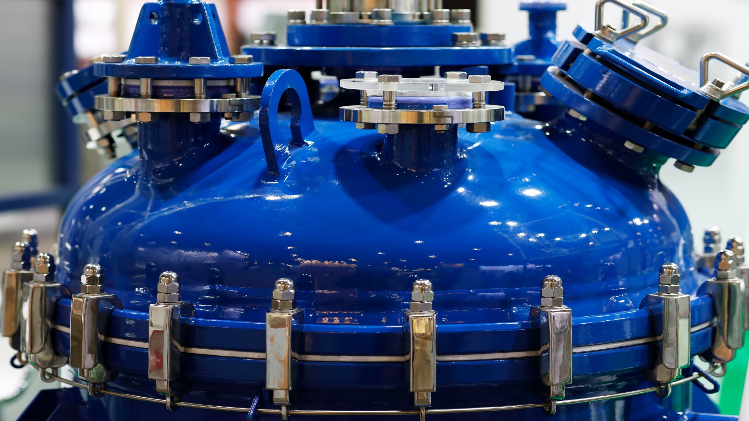 Enameled steel chemical reactor equipment. Selective focus.