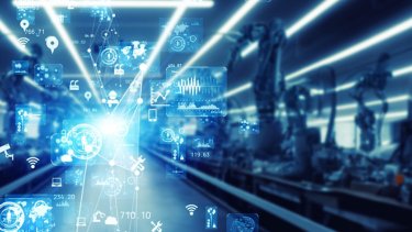 Futuristic factory with robot arms and communication network concept. Factory automation. IIoT.