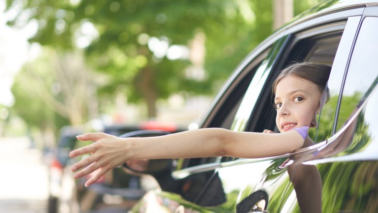 Girl riding in car