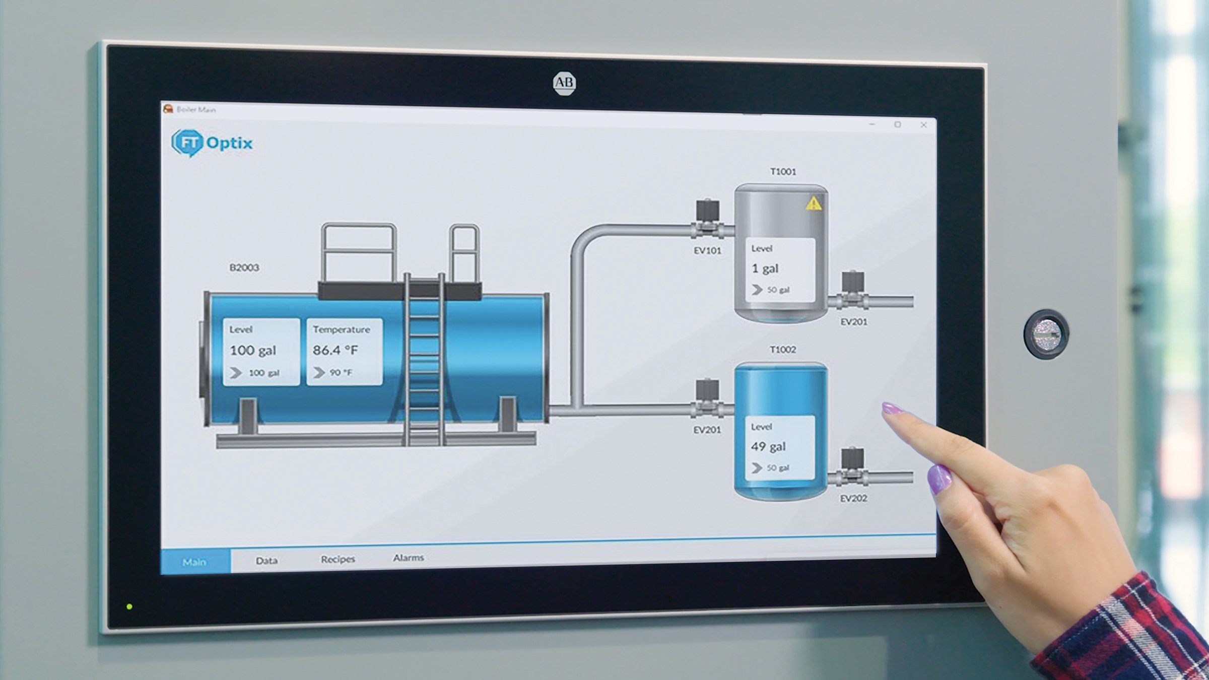 Woman's hand using OptixPanel graphic terminal touch screen running FactoryTalk Optix software.