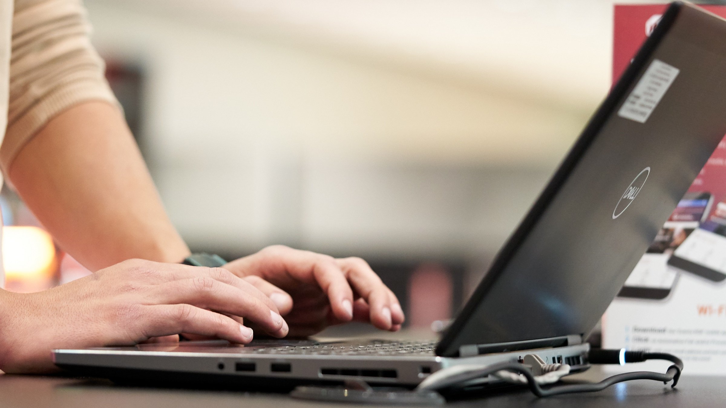 Man typing on laptop