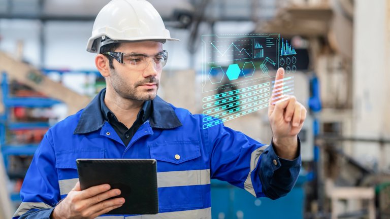 A portrait of a confident engineer  touch the button at the screen and use digital tablet in a heavy industrial factory, concepts engineer working in the factory.