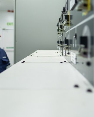 Man is in a test room and validate product