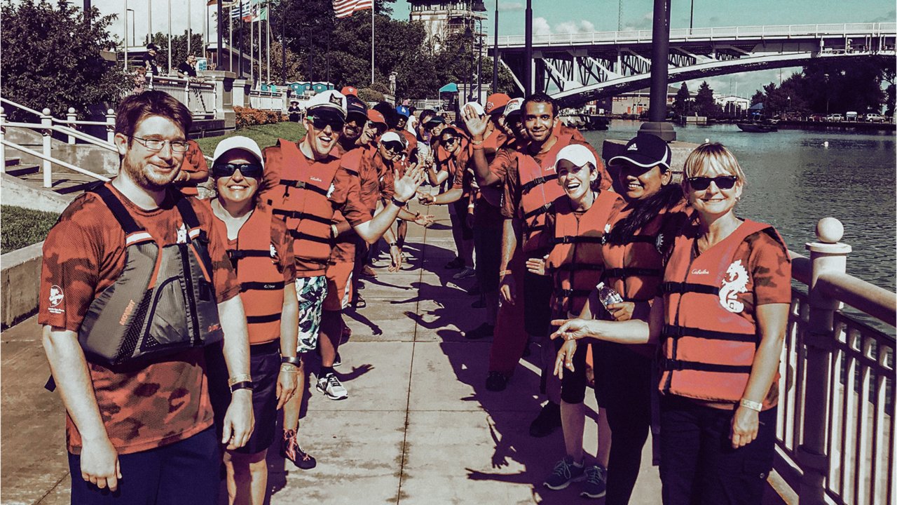 A team made up of the MVAG and Rockwell Automation Asian Pacific (RAAP) employee resource groups compete in the Dragon Boat Festival Race in Milwaukee.