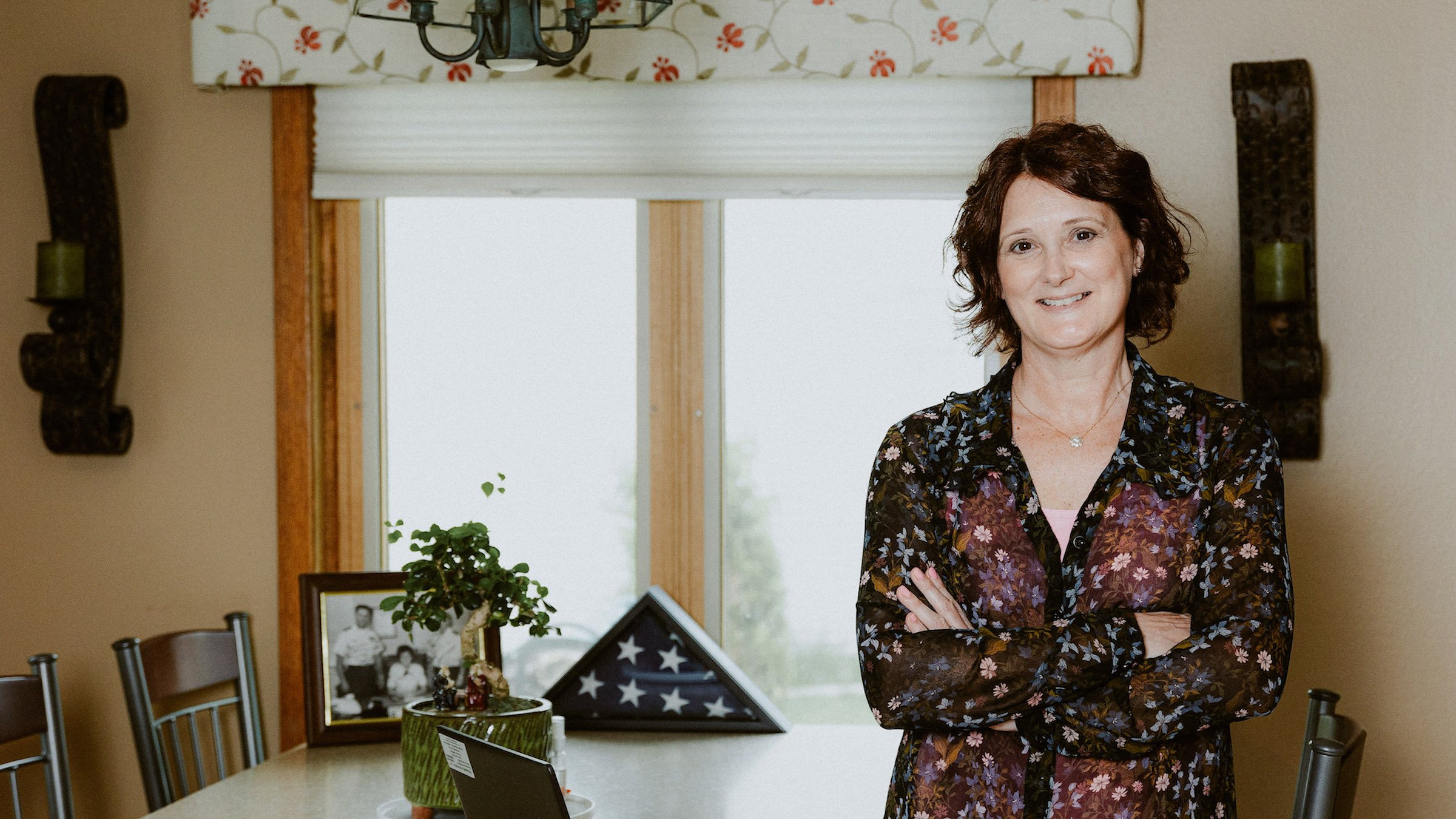 MVAG ERG member and veteran Cari Tralongo poses in her kitchen at home.