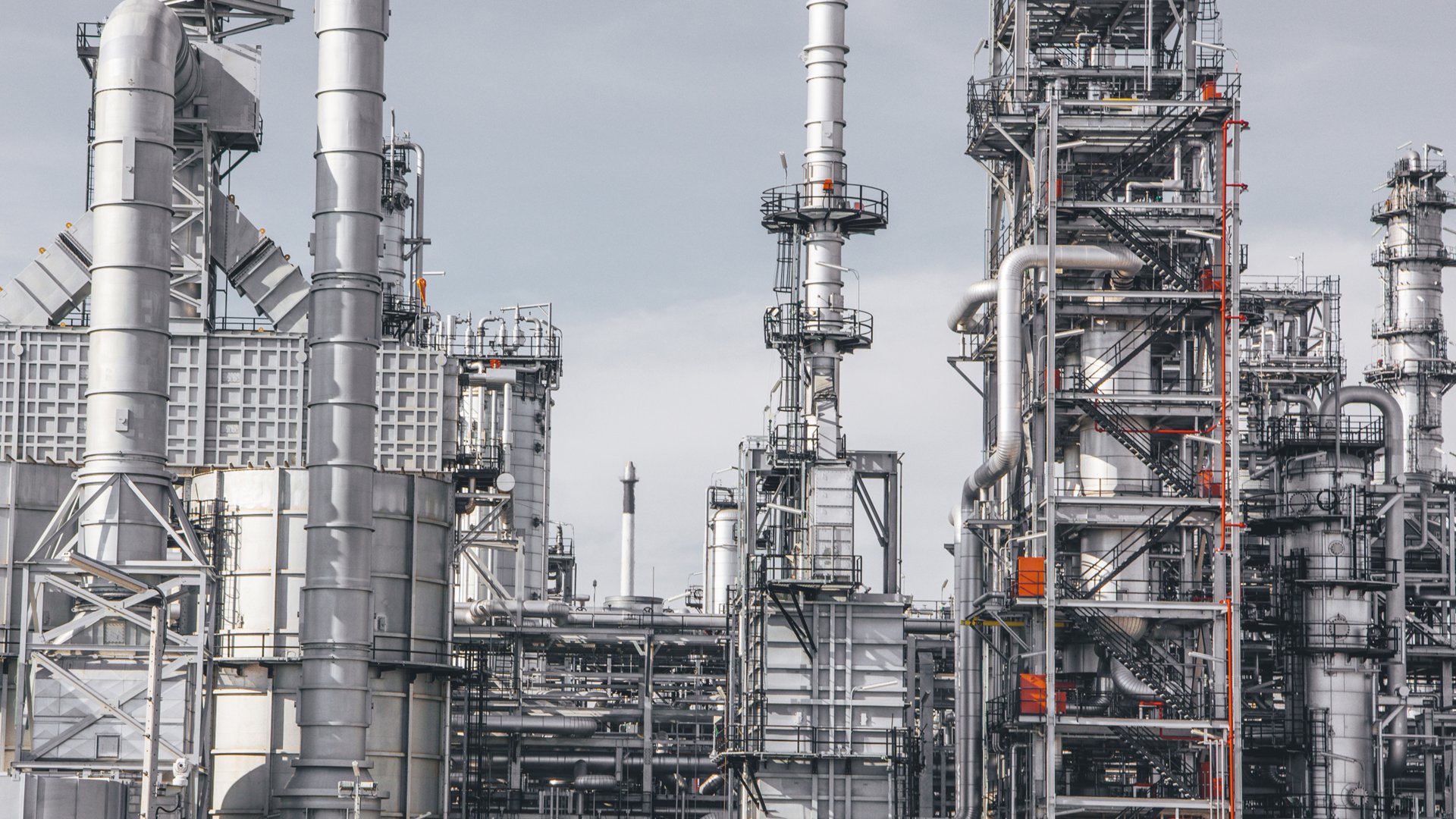 Industrial zone,The equipment of oil refining,Close-up of industrial pipelines of an oil-refinery plant,Detail of oil pipeline with valves in large oil refinery.