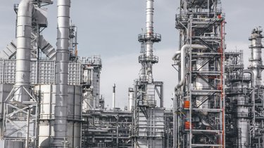 Industrial zone,The equipment of oil refining,Close-up of industrial pipelines of an oil-refinery plant,Detail of oil pipeline with valves in large oil refinery.