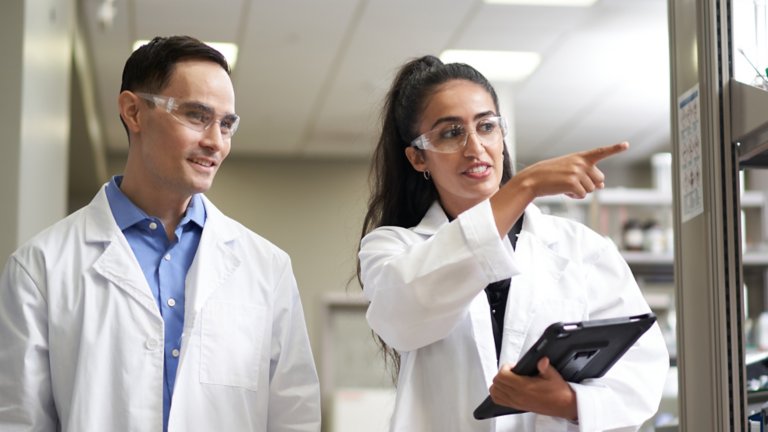 Life Science People on meeting with tablet