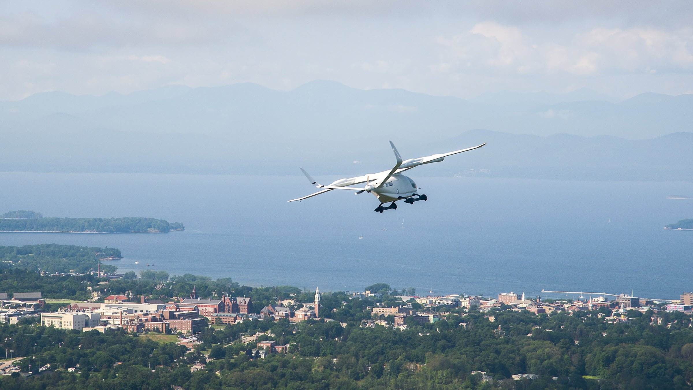 A plane flying over a city