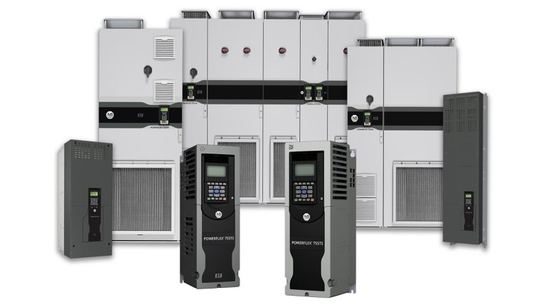 Three tall gray rectangular PowerFlex 755T variable frequency drives with black bands accross the middle sits in back. Two thinner, shorter VFDs sit on each side. Two smaller, thinner light gray drives with black faces sit front and center.