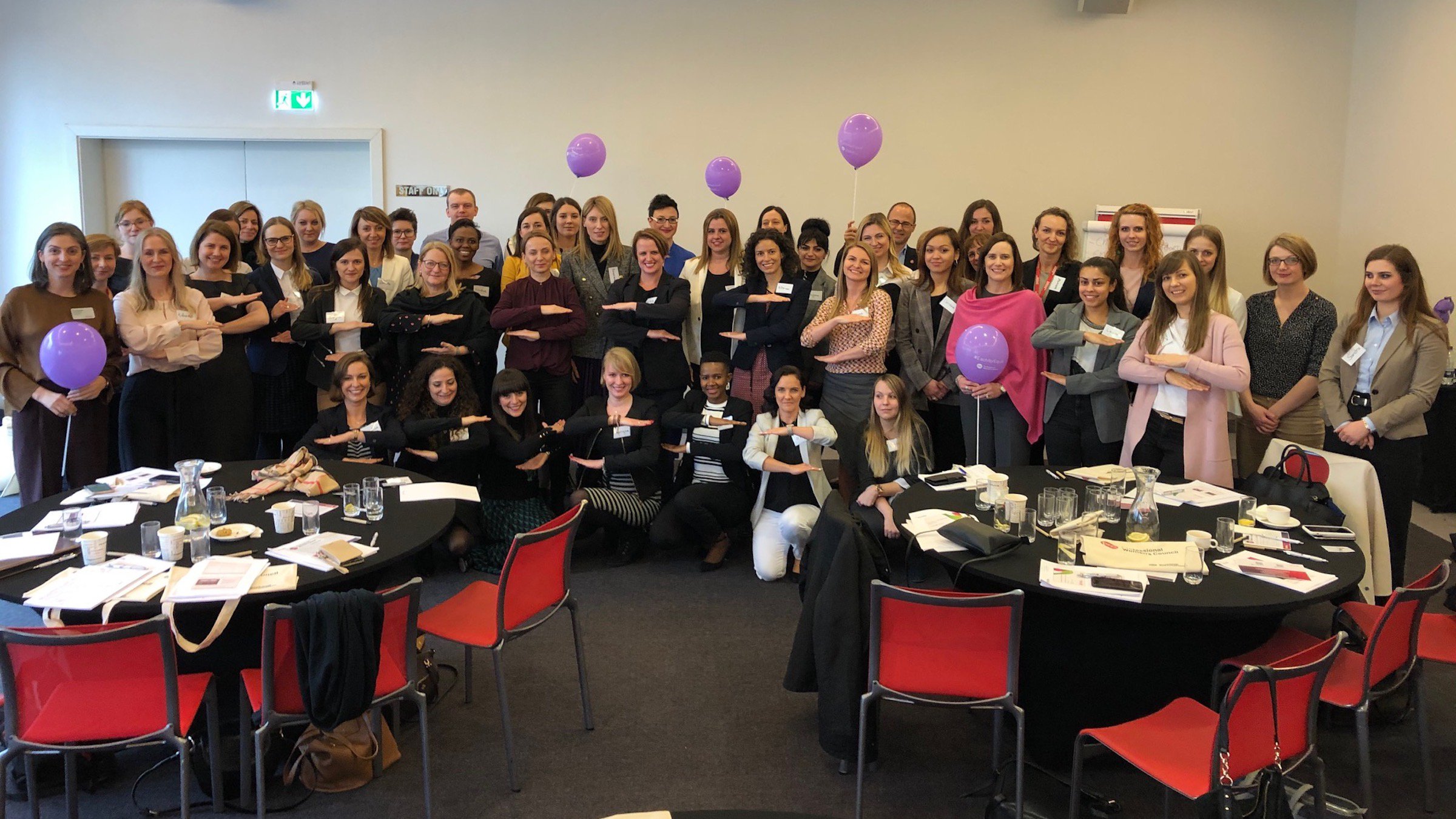 Members of the Professional Women's Council (PWC) EMEA celebrate International Women's Day in 2020.