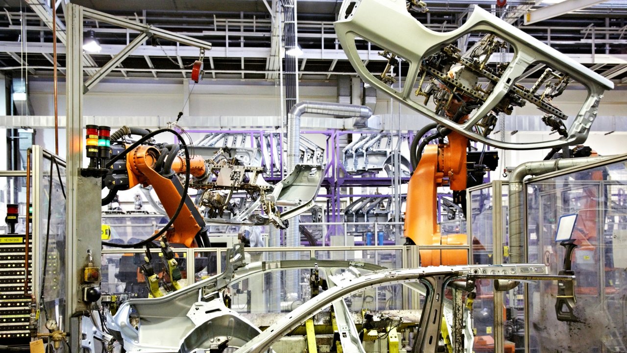 industrial robots in an automotive manufacturing facility