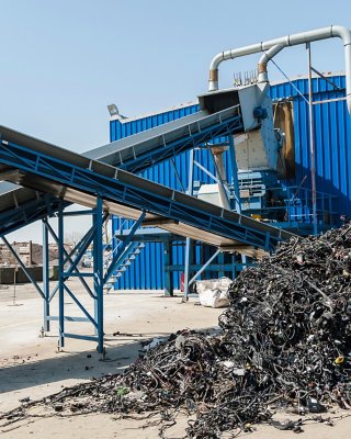 Plastic recycling facility/Plastic and rubber components resulted from cars disassembled are being shredded and separated during recycling process
