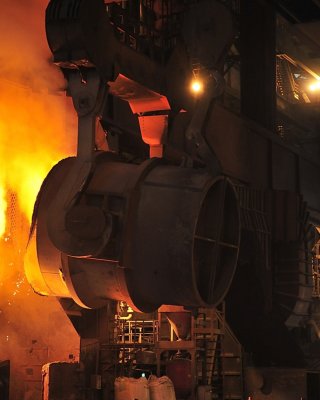 Smelting of the metal in the foundry at steel mill
