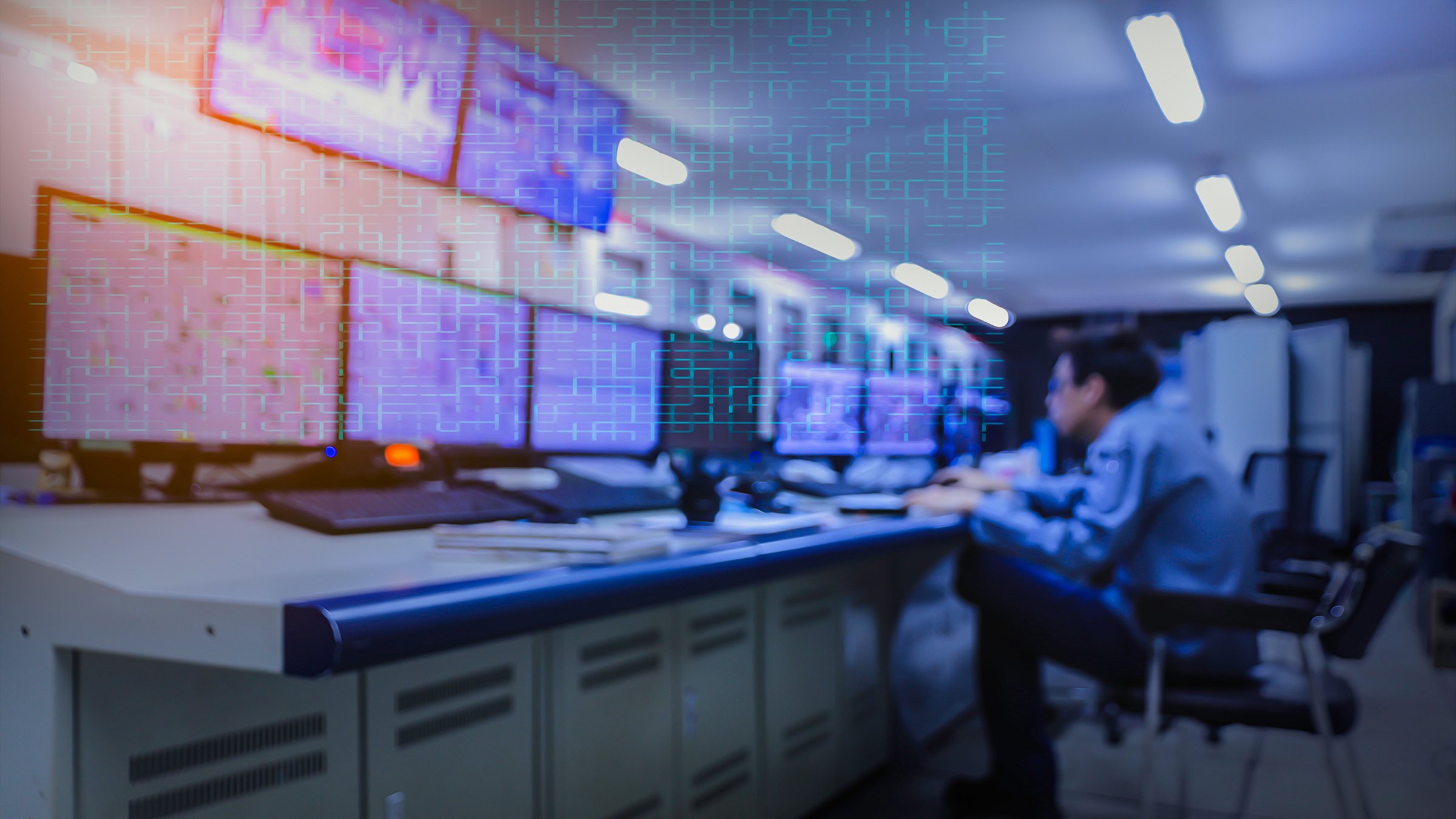 Blurred of man engineer works with the tablet in the production control room.Control room of a steam Turbine,Generators of the coal-fired power plant for monitor process, business and industry concept