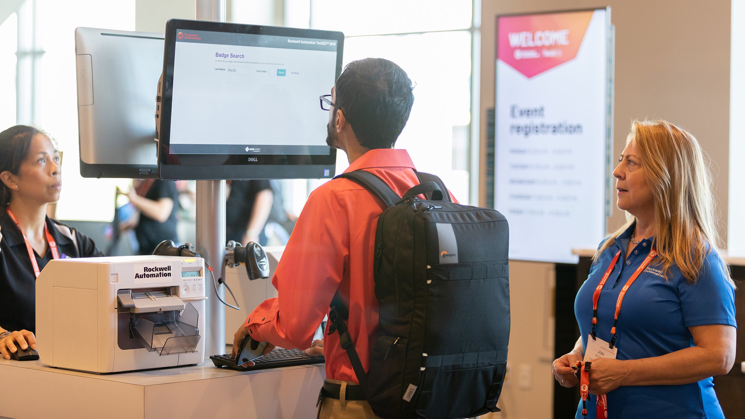 Customer using a registration kiosk to complete their registration to attend a Rockwell Automation event.