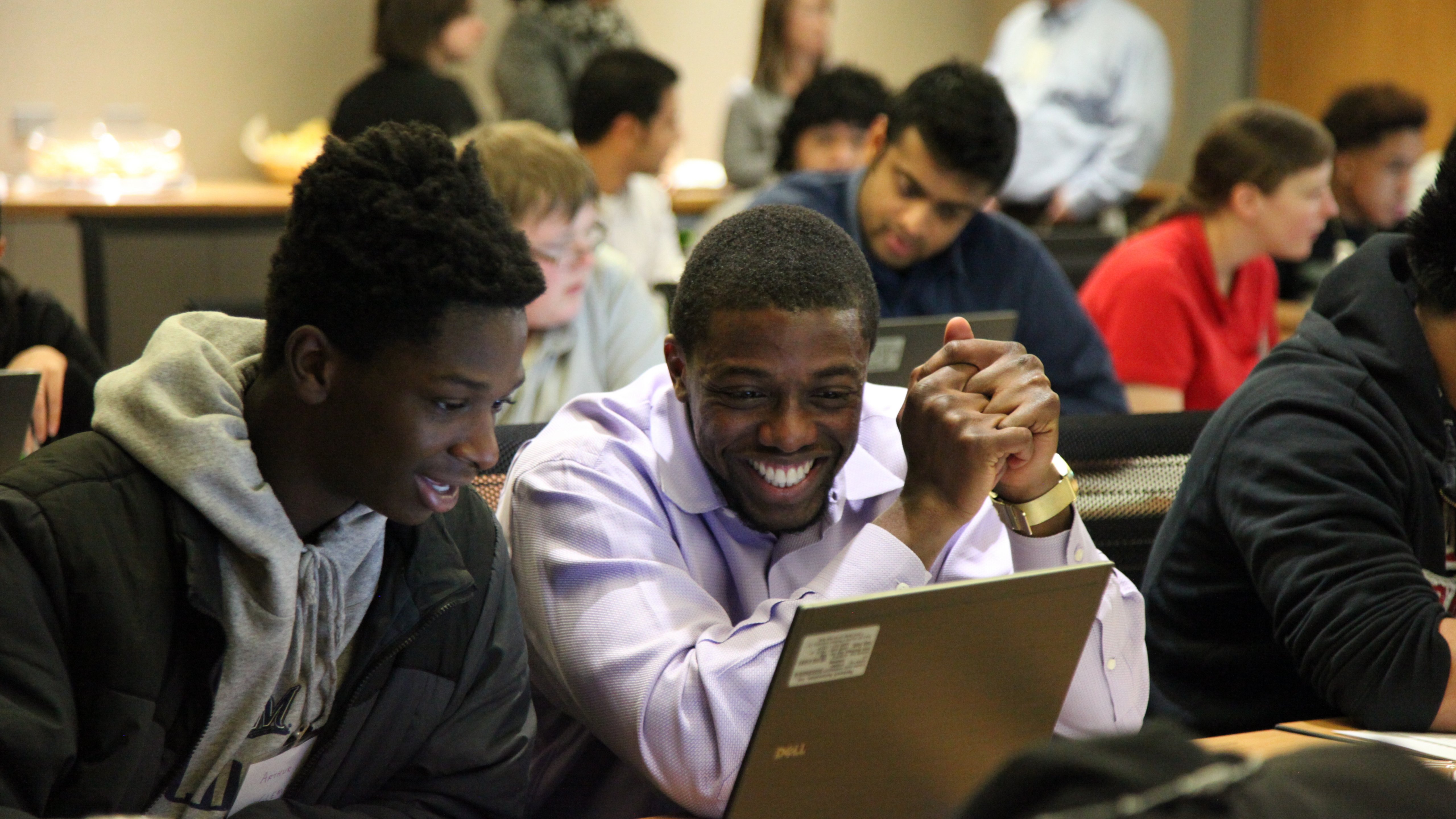 Two Africa students in classroom with computer