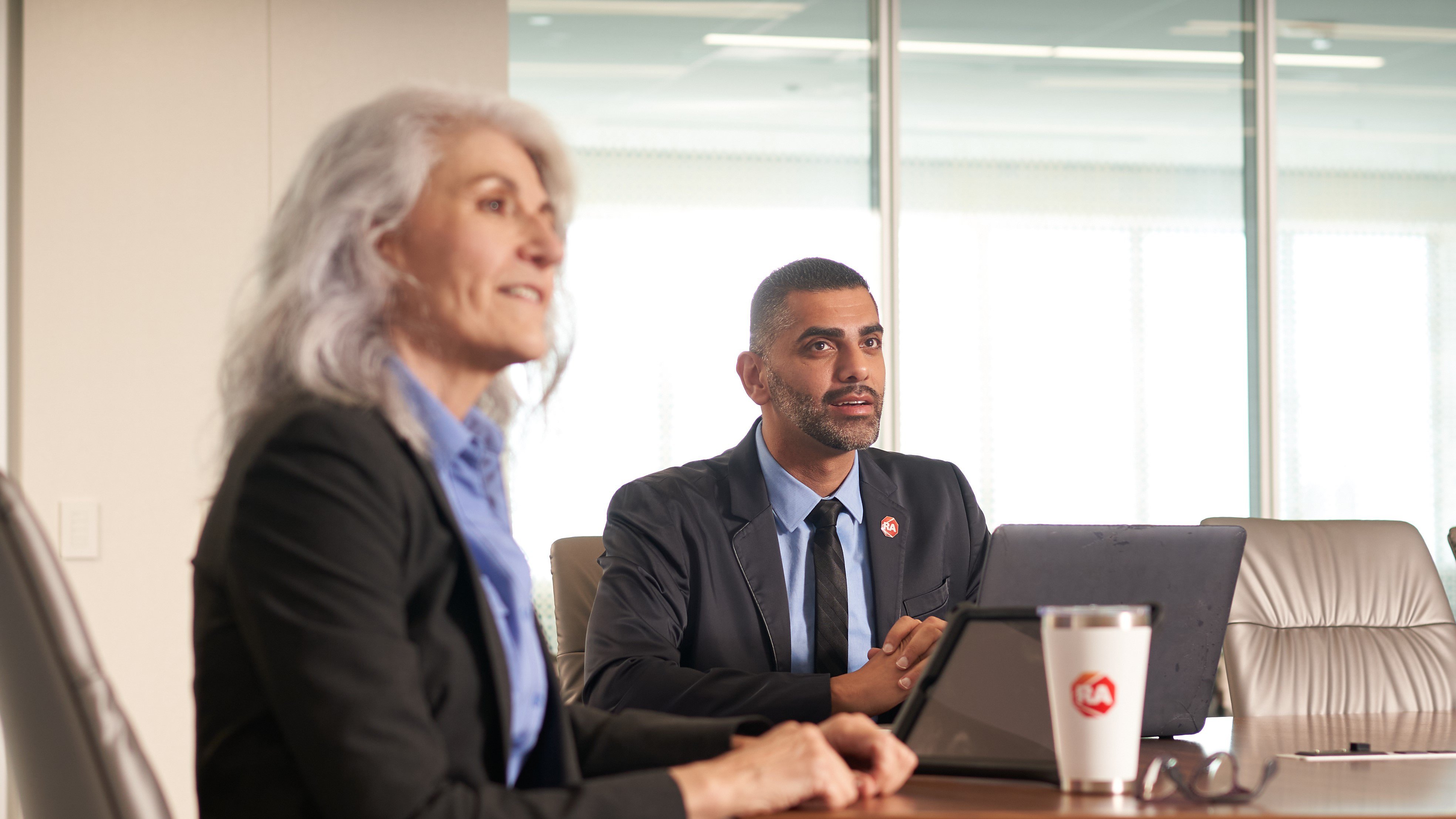 Rockwell employees sitting in a conference room