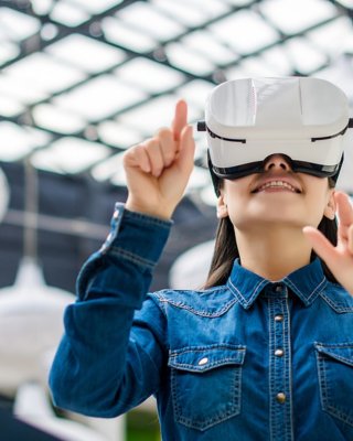 Woman engineer wearing VR headset
