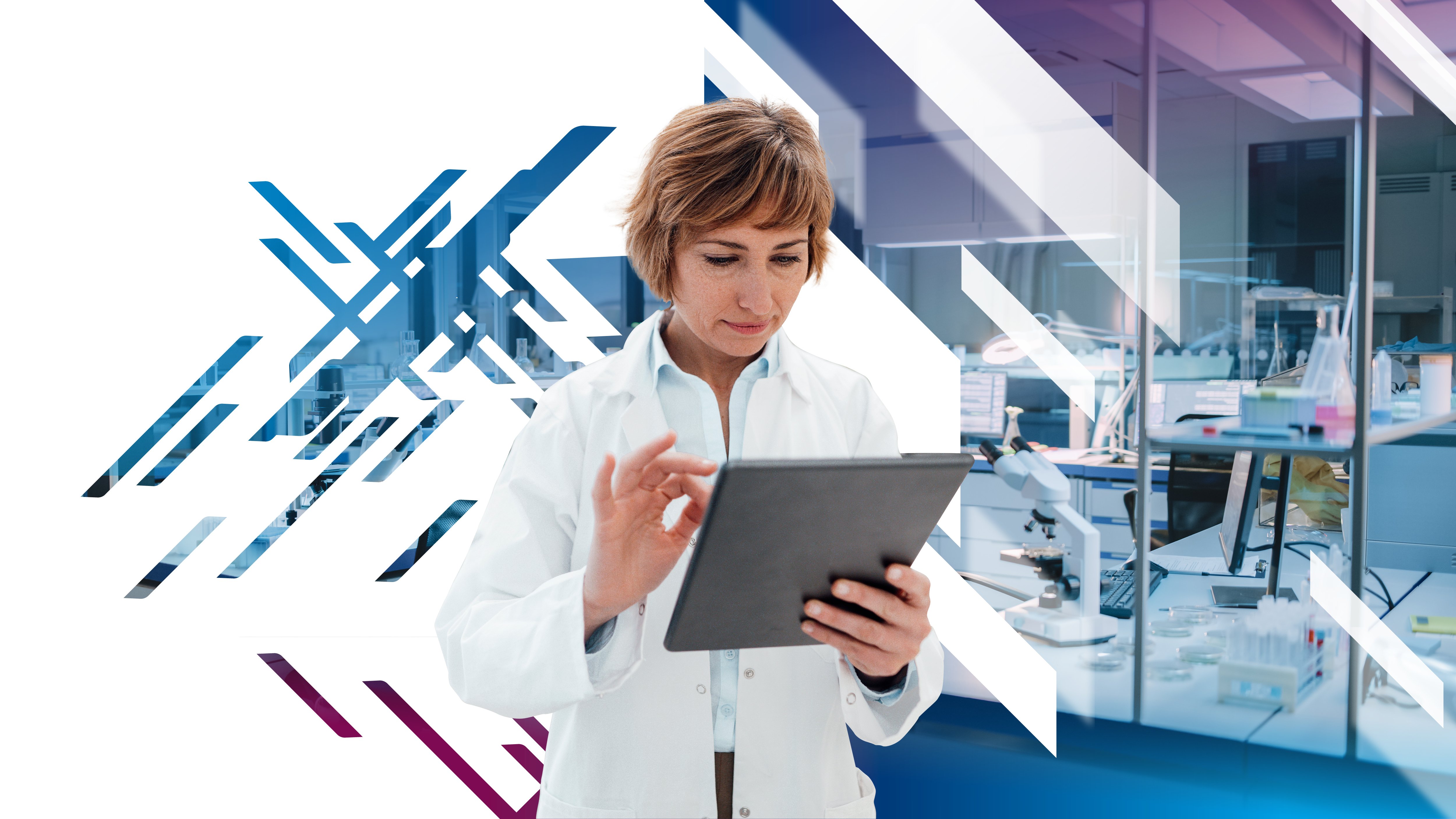 Woman in white coat in pharma lab