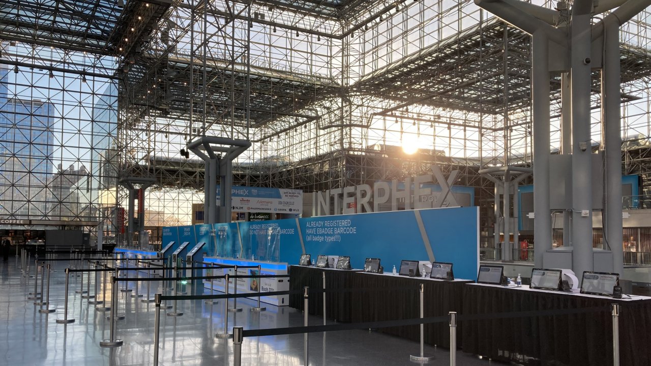 The sun shines through the windows of the Javits Center in New York City and onto the registration zone for INTERPHEX 2021.