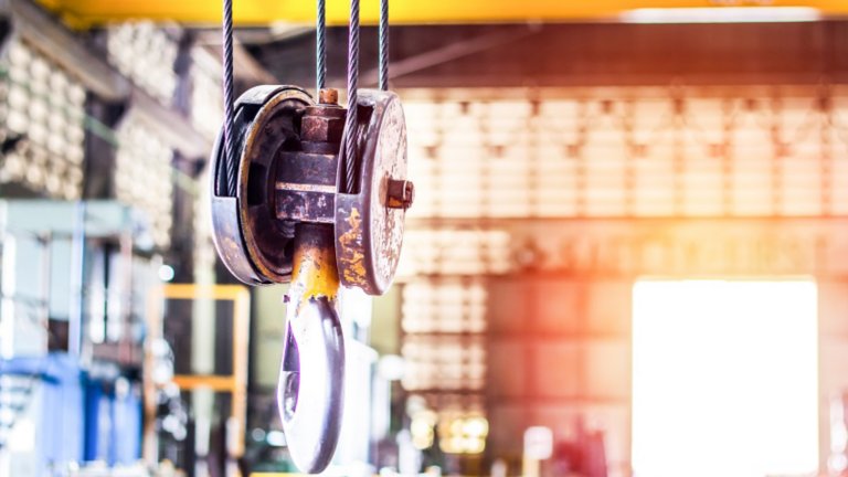 Close up old crane hook for overhead crane in factory